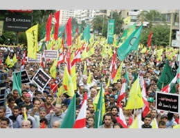 masses of participants attend Hezbollah’s protest rally in Beirut’s southern suburb. 