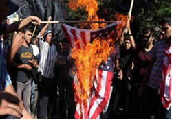 United States flag burned in front of the U.N. headquarters in Gaza (Paltoday, September 12, 2012).