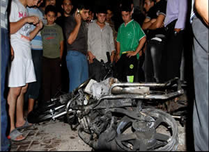 The motorbike ridden by Abu al-Walid al-Maqdisi and his aide in the Jabalia refugee camp in the Gaza Strip (Wafa News Agency, October 13, 2012).