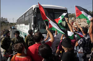 Palestinian activists and foreign anti-Israeli activists block a road in the Bethlehem district (the village of Al-Ma'sara) during a weekly riot against the security fence, October 19 (Wafa News Agency, October 19, 2012).