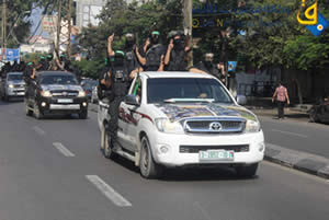 Izz al-Din al-Qassam Brigades operatives deploy throughout the Gaza Strip as part of the events marking the release of the Palestinian terrorists in the Gilad Shalit deal (Qudsnet and Shihab websites, October 18, 2012).