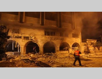 The attack on Hamas' Islamic National Bank (Filastin al-'Aan, November 19, 2012). 