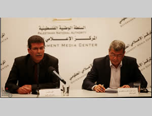 Qadoura Fares (left), chairman of the Palestinian prisoners' club, and Issa Qaraqa (right), Palestinian minister of prisoners' affairs, hold a press conference in Ramallah.