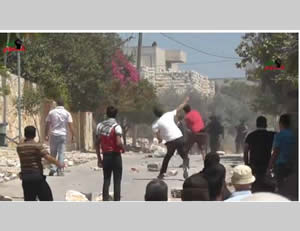 Confrontations between Palestinians and the Israel security forces in the village of Qadoum (Fatah Facebook page, August 9, 2013).