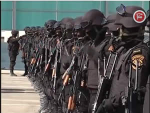 Palestinian security force operatives in Jenin (Ma'an News Agency, October 2, 2013).