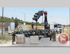 IDF Streitkräfte sperren die Einfahrt nach Hebron (Maannews.net, 15. Juni 2014).