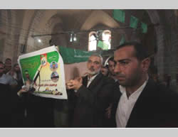 Ismail Haniya helps carry the coffin of one of the five Hamas terrorists killed in the tunnel explosion 