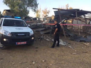 A rocket that hit a Bedouin village in the Negev. Two young girls were wounded, one of them critically (Facebook page of the Israel Police Force, July 15, 2014). 