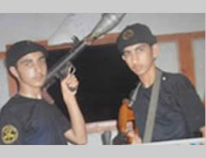 Iyad Shurab (left) and his brother Wassim Shurab (right) in the uniform of the PIJ Al-Quds Battalions, both armed (saraya.ps). The picture was taken at a time when they were adolescents, further example of the recruitment of adolescents into the ranks of terrorist organizations in the Gaza Strip.