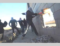 Popular Resistance Committees operatives vandalize the security forces  (PALDF, November 8, 2014).