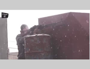 ISIS operatives fighting in Kobani in a heavy snowfall (Facebook page affiliated with the Peshmerga in the Kobani area, January 16, 2015)