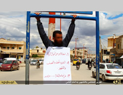 Public flogging of a man convicted of embezzling charity funds in Al-Raqqah (justpaste.it, April 18, 2015)