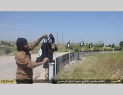 ISIS flags hanging in the town of Sarrin (ISIS-affiliated Twitter account, May 3, 2015)