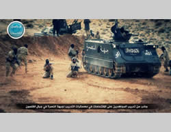 Al-Nusra Front operatives training with the support of APCs in the Al-Qalamoun Mountains