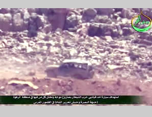 Hezbollah jeep damaged by an anti-tank missile fired in the area of Al-Rahwe, in the western Al-Qalamoun Mountains 