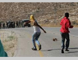 Masked Palestinians riot and clash with IDF forces in the village of Duma after the funeral of Sa'ad Dawabsha (Wafa News Agency, August 8, 2015).