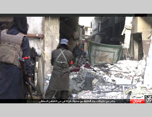 ISIS operatives near checkpoints taken over from the rebel forces in Damascus’s Al-Tadamon neighborhood (ISIS-affiliated Twitter account, October 16, 2015)