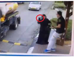 From the security camera footage at the entrance to Beitar Ilit. It shows Hilwa Alian taking the knife out of her bag and stabbing the security guard. 