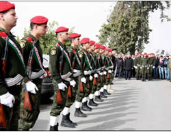  The formal military funeral held for the terrorist by the PA. His body is carried on the shoulders of PA national security forces' operatives (Wafa News Agency, November 5, 2015).