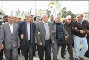 Senior Fatah figures in Judea and Samaria, among them Mahmoud al-'Alul (center), visit the town of Qabatiya and the families of the three terrorists who carried out the shooting and stabbing attack at the Nablus Gate in Jerusalem 