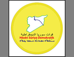 The SDF logo (Facebook page of the SDF, March 11, 2016). The upper inscription is in Arabic, the middle in Kurdish and the lower in Syriac.