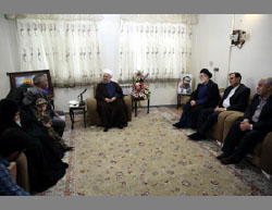 President Rouhani at the home of the family of Hamid Reza Asadollahi 