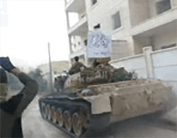 Tank belonging to Jaysh al-Fatah, an umbrella framework in which the Al-Nusra Front plays a major role, during the offensive in southwestern Aleppo. 