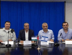 Right to left: Director-General, Ministry of Finance, Shai Babad, Finance Minister Moshe Kahlon, Minister of Civil Affairs in the Palestinian Authority, Hussein Al Sheikh, Coordinator of Government Activities in the Territories, General Yoav (Poli) Mordechai, at the signing ceremony for settling the Palestinian electricity debts to Israel (Israel Ministry of Finance Facebook page, September 13 2016)