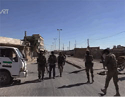 Free Syrian Army members in Dabiq after the town had been taken over from ISIS (SMART News Agency YouTube channel, October 16, 2016).