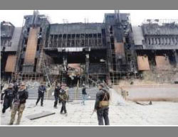 Iraqi soldiers at the university; destruction is evident. 