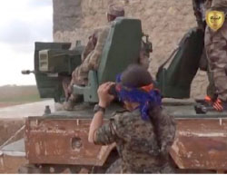 Kurdish soldiers firing at the Euphrates Shield forces advancing towards Manbij (website of the Military Council of Manbij and its Outskirts, March 7, 2017)