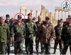 Syrian Defense Minister Fahd Jassem al-Freij (marked with a circle), during a visit at the Old City of Palmyra after its liberation from ISIS (Syrian TV, March 4, 2017)