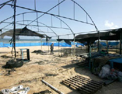 The ruins of an UNRWA summer camp burned by armed masked men. At the scene the police found a notice warning UNRWA not to continue activities that 