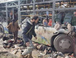 Bodies of children from the villages of Al-Fu'ah and Kafraya and a destroyed bus at the scene of the attack. Left: charred cars at the scene (Haqq, April 15, 2017)