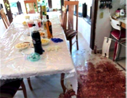 The aftermath of the stabbing attack in the community of Halamish northwest of Ramallah, where three members of a family were murdered by a Palestinian in retaliation for 