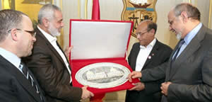 Ismail Haniya meets with heads of the Tunisian administration (Izz al-Din al-Qassam Brigades website, January 8, 2012)