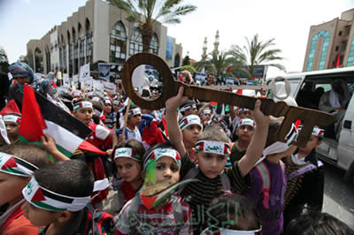 A Palestinian child in Gaza City holds up a key, symbol of the Palestinian refugees' so-called “right of return” to the State of Israel