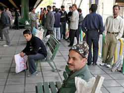 Government critics once again question official unemployment data as Ahmadinejad and vice president make promises to solve unemployment problem