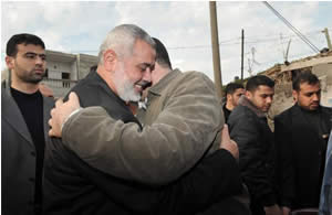 Ismail Haniya, head of the de facto Hamas administration, welcomes Ayman Nofel on his return to the Gaza Strip