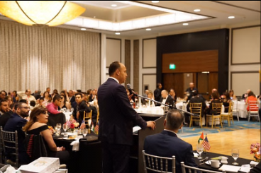 Husam Zomlot delivers a speech at the annual of conference of the Bethlehem Association in the United States (Facebook page of Husam Zomlot, August 6, 2017).