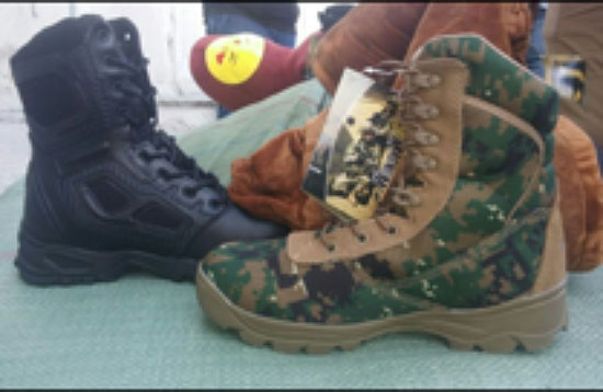 Military boots hidden in a shipment of winter slippers (Facebook page of the Israeli Ministry of Defense, October 8, 2017)