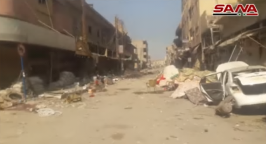 Photos from the video: Right: City Square of Al-Mayadeen. Left: Partial destruction of one of the streets of Al-Mayadeen (SANA YouTube account, October 21, 2017)