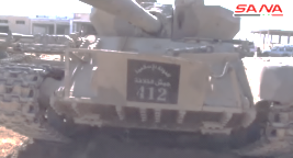 Tank de l'Etat islamique portant l'inscription "État islamique, l'Armée du califat 412". 