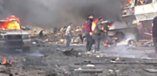 The scene of the car bomb explosion at the location for Deir al-Zor deportees (Syrian TV, November 5, 2017).