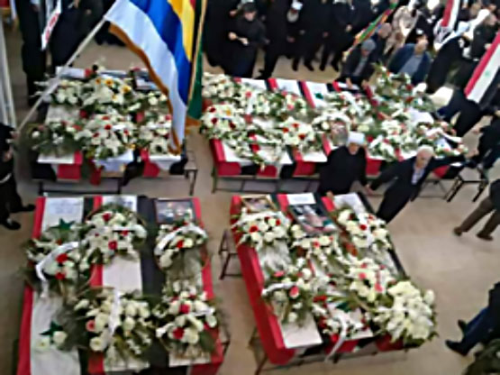 The coffins of the 16 victims of the car bomb in the Druze village of Hader (Twitter account of lamloma@lamloma3, November 5, 2017)