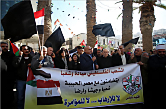 Solidarity demonstration with Egypt held in Nablus with the participation of Akram Rajoub, the governor of the Nablus district (Wafa, November 26, 2017).