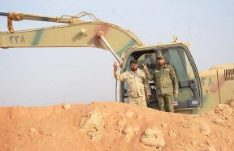 Heavy machinery works on the border between Iraq and Syria by Popular Mobilization operatives to prevent infiltration of ISIS operatives from Syria into Iraq (Iraqi News Agency, October 29, 2017)