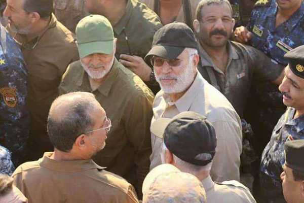 Qasem Soleimani with Abu Mahdi al-Muhandis (Mehr, May 27, 2016).