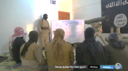 ISIS operatives in class in an anti-tank missile course. The instructor is giving an explanation of the advanced Russian Kornet anti-tank missile. 