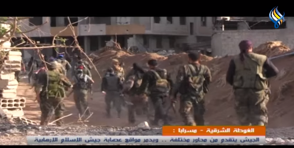 Syrian army soldiers on the southern route leading to the city of Duma (Sama, April 8, 2018)